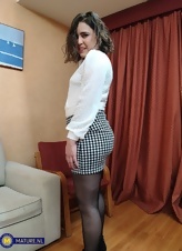 Mature Brunette In Skirt Tease Gallery