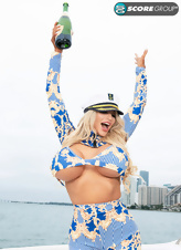 Big Tit Blonde Yacht Striptease Pics